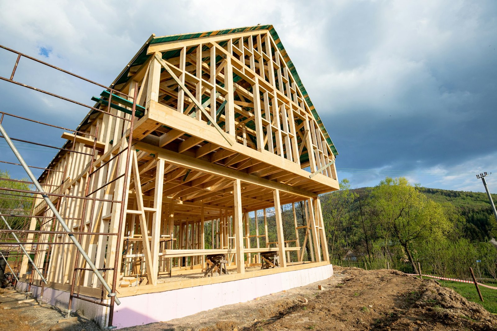 Residential home construction, frame wooden house outdoor